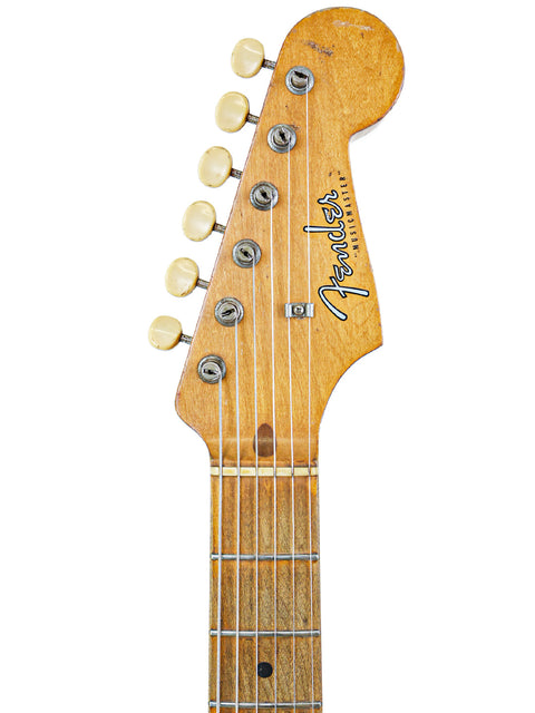 Vintage 1957 Fender Musicmaster guitar, representing the classic Stratocaster look and rich musical history.