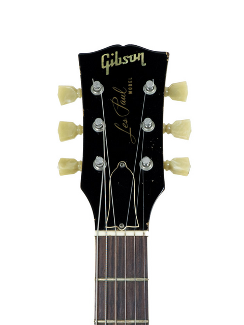 Vintage 1961 Gibson Les Paul Custom Jr. guitar, showcasing its classic design and narrow headstock, a true collector's item.