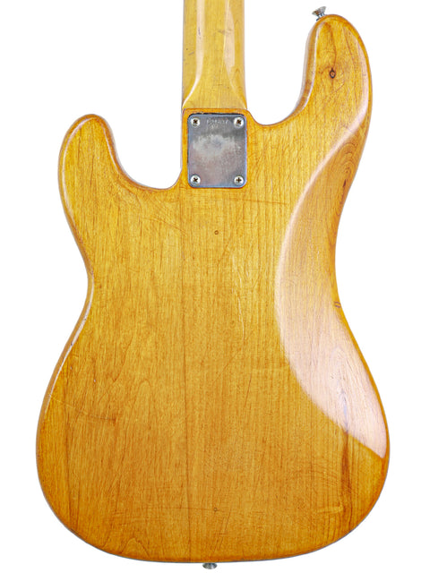  Vintage 1963 Fender L-Series Precision Bass, showcasing a rich wooden body and neck, perfect for any music lover.