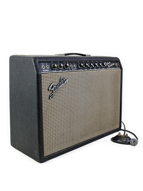 Vintage 1967 Fender Deluxe Reverb Blackface Combo tube amp, showcasing classic 60s design and powerful 60W output.