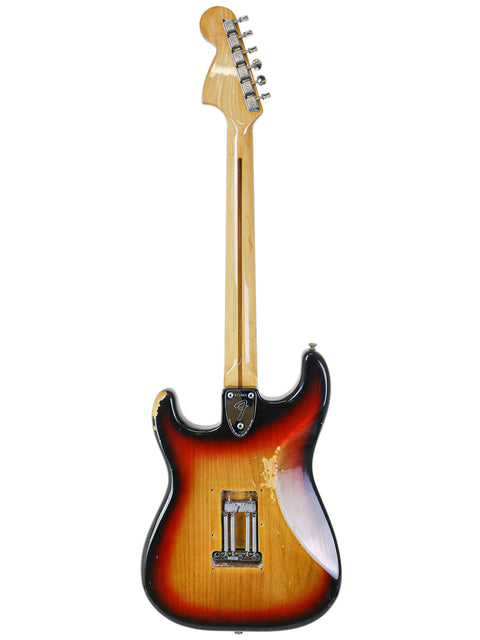  Vintage 1974 Fender Stratocaster with a sunburst finish, showcasing its classic design and rich color tones.