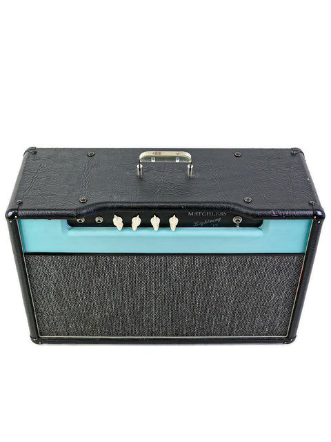 Vintage 1997 Matchless Lightning 15 Combo guitar amplifier in black and turquoise, featuring a stylish and compact design.