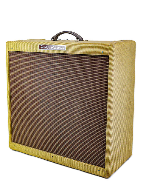 Vintage Fender Bassman amplifier with a brown grill and yellow tolex cover.