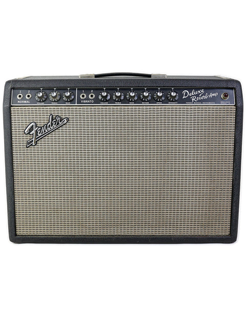 Vintage Fender Deluxe Reverb Blackface Combo amplifier from 1967, showcasing classic design and rich sound quality.
