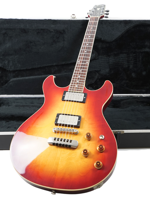 Vintage Fender Esprit guitar with a stunning sunburst finish, safely stored in its case, from Japan, 1984.