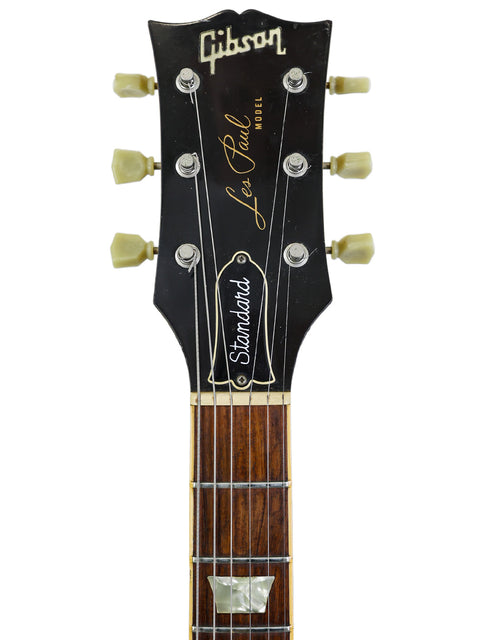 Vintage Gibson Les Paul Custom from 1979, exemplifying timeless design and superior craftsmanship in a stunning display.