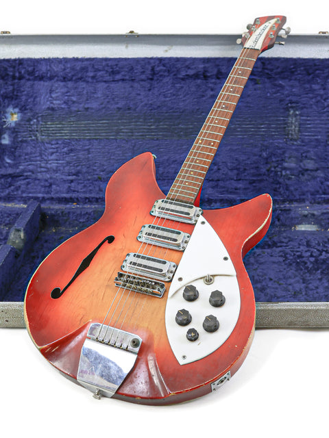 Vintage Rickenbacker 1998 (345) electric guitar in a case, reflecting the artistry of USA craftsmanship from 1965.