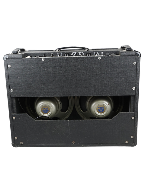 Vintage Vox AC-30 Top Boost amplifier case with dual speakers, ex. Hank Marvin, capturing the essence of 1975 rock music.