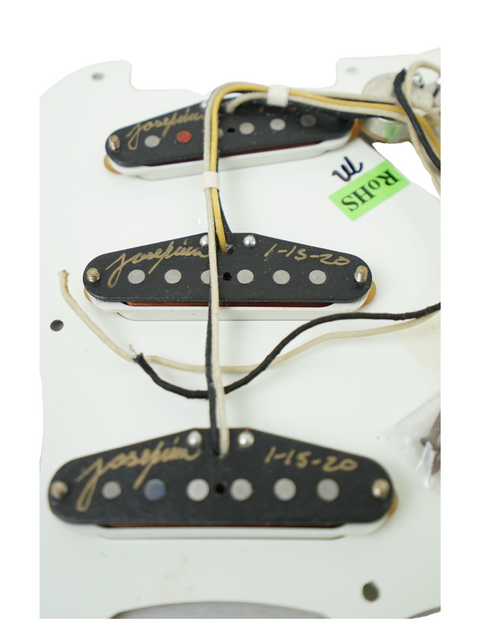 White guitar pickup with two strings and two wires, part of a Fender Custom Shop 1955 Relic Stratocaster Loaded Pickguard.