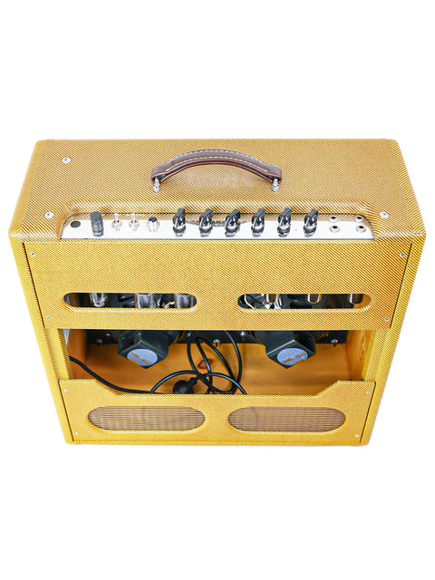 Yellow Victoria 45410-T 'Bassman' guitar amp featuring a brown leather handle, made in the USA in 2007.