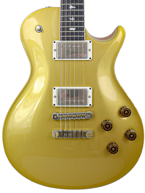 Yellow electric guitar, PRS McCarty Singlecut 594 model, displayed on a plain white background.