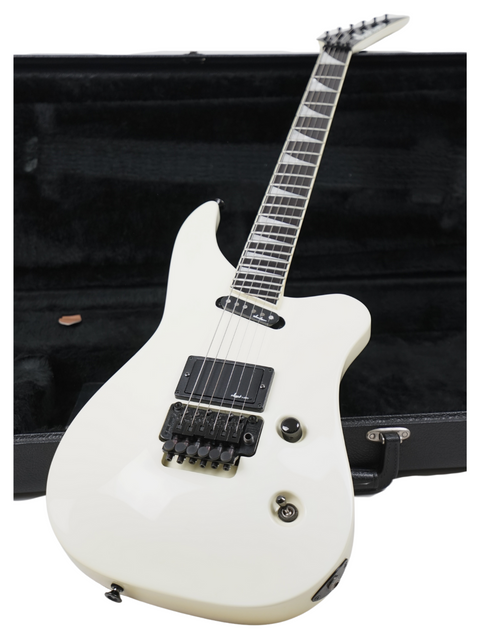 white electric guitar nestled in a case, featuring the Jackson Phil Collen Signature PC1 Archtop, crafted in the USA, 1989.