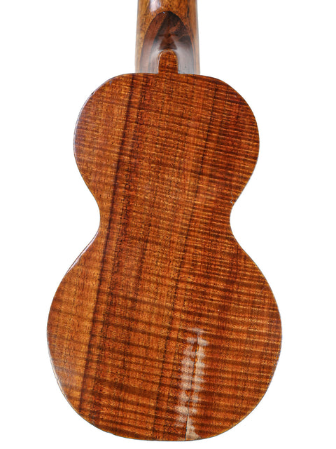 wooden-bodied Kumalae ukulele from the 1920s, highlighting its elegant neck and rich history in Hawaiian music.