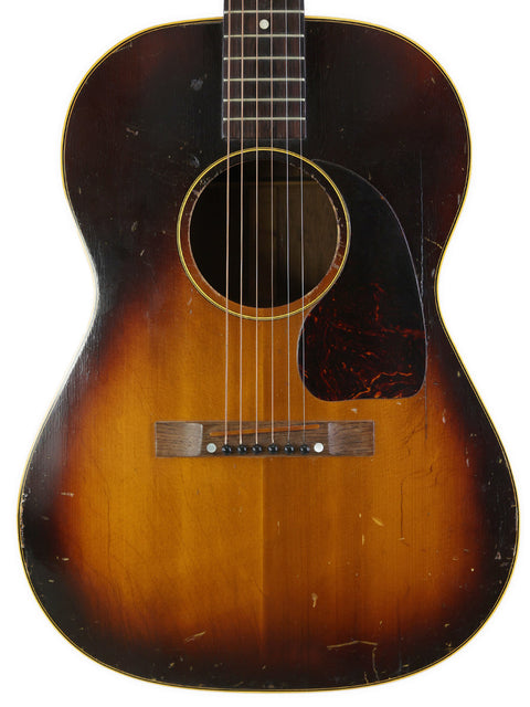 1951 Gibson J-45 guitar in sunburst, highlighting its vintage charm and iconic craftsmanship.