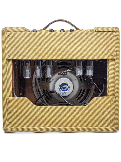 1952 Vintage Fender Tweed 5B3 Deluxe amplifier featuring a wooden case and speaker, highlighting retro audio aesthetics.