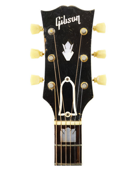  1961 Gibson Les Paul Custom guitar, known for its timeless style and exceptional tone, a must-have for any guitarist.