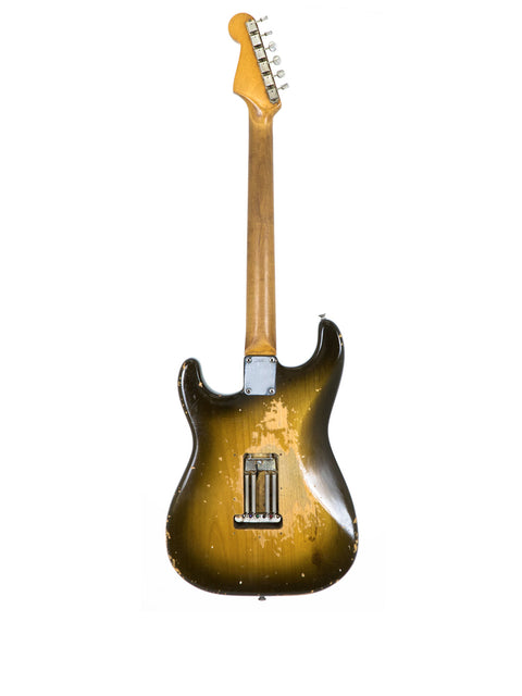  1963 L Series Stratocaster guitar with a warm brown and gold finish, representing vintage design and exceptional quality.