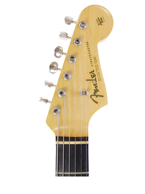  1964 Fender L Series Stratocaster in striking Fiesta Red, representing a timeless electric guitar with vintage appeal.
