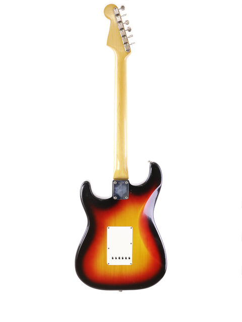1964 Vintage Fender L Series Stratocaster with sunburst finish, showcased on a pristine white background.