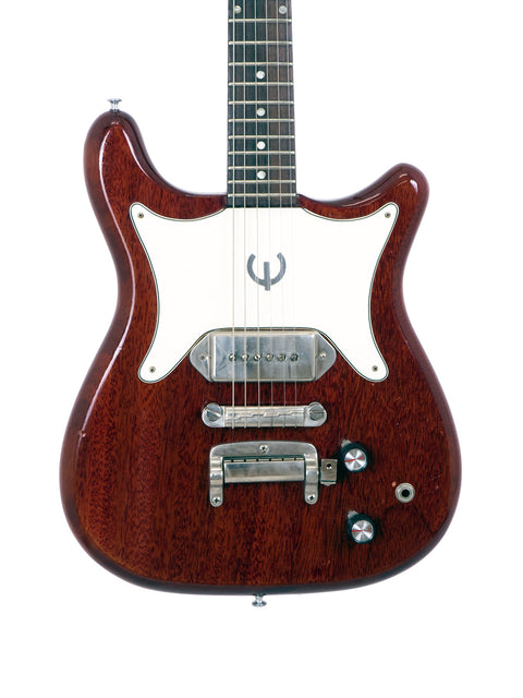 1965 Epiphone Coronet guitar featuring a brown body and a white pickguard, showcasing classic vintage design.