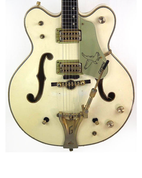 1968 Gretsch 6136 White Falcon guitar with elegant gold and black pickguards, ideal for adding style to your music collection.