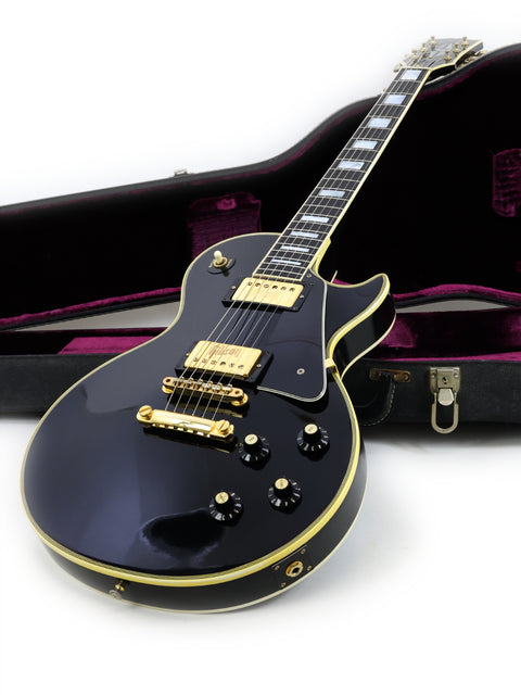 1972 Gibson Les Paul Custom in black, showcasing beautiful gold hardware details.