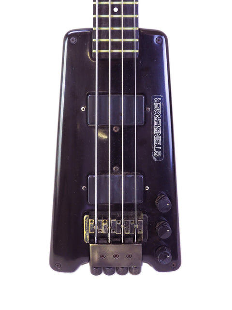 1982 Steinberger L2 bass guitar in black, displayed on a simple white backdrop.
