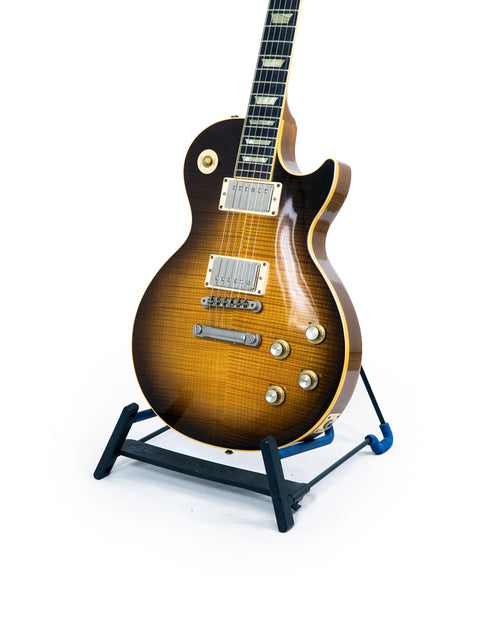 1993 Gibson Les Paul Standard guitar stand featuring a Pre-Historic 1960 Reissue, highlighting its iconic craftsmanship.