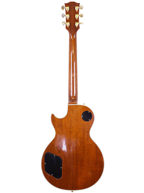1994 Gibson Les Paul Custom in natural wood, highlighting its sleek body and iconic features, perfect for any guitarist.