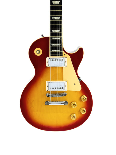1998 Gibson Les Paul Standard in a stunning sunburst finish, highlighting its classic design and craftsmanship.