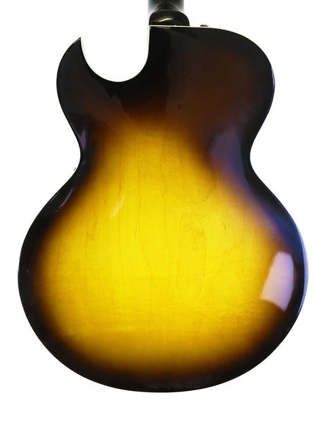 2001 USA-made Gibson ES-135 guitar featuring a beautiful sunburst finish, highlighting its rich, warm tones.