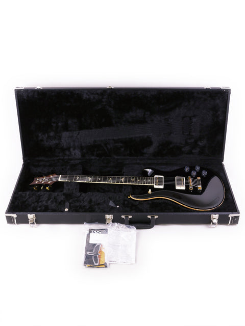 2016 PRS McCarty 594 in black, a custom shop guitar from the USA, featuring a classic and sophisticated design.