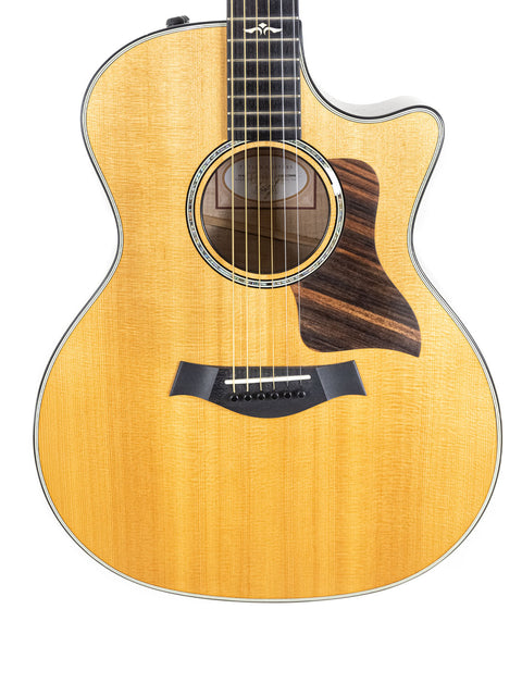 2016 Taylor 614ce grand acoustic guitar, featuring a beautiful finish and premium materials.