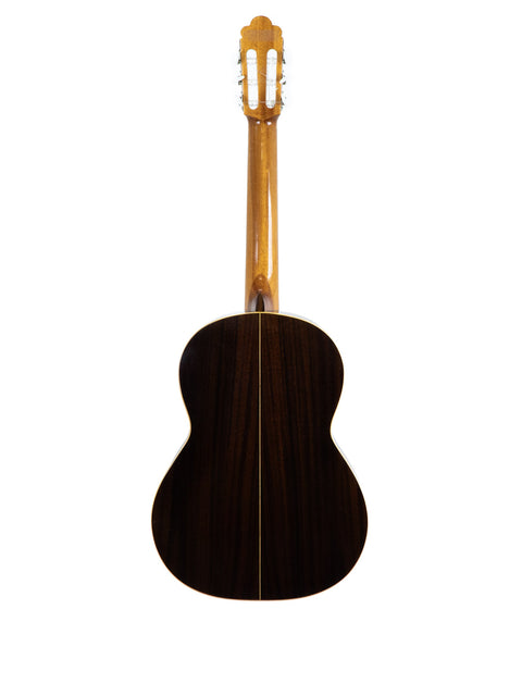 A 1979 Vicente Sanchis Model 34 Classical guitar from Spain, highlighting its elegant wooden back and neck.