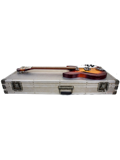 A 1994 Rickenbacker 330 bass guitar in its case, showcasing a vibrant Fireglo finish on a white backdrop.
