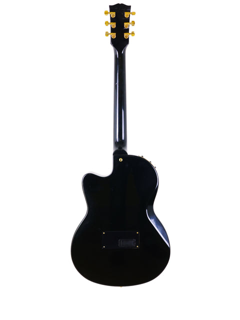 A 1998 black Gibson Chet Atkins SST electric guitar displayed on a white background, highlighting its elegant features.