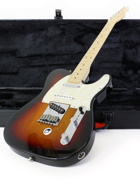 A 2015 Fender Nashville B-Bender Telecaster guitar displayed in its case on a black backdrop.