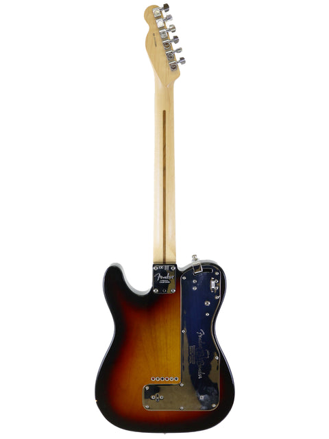 A 2015 USA Fender Nashville B-Bender Telecaster featuring a striking sunburst finish on its electric guitar body.