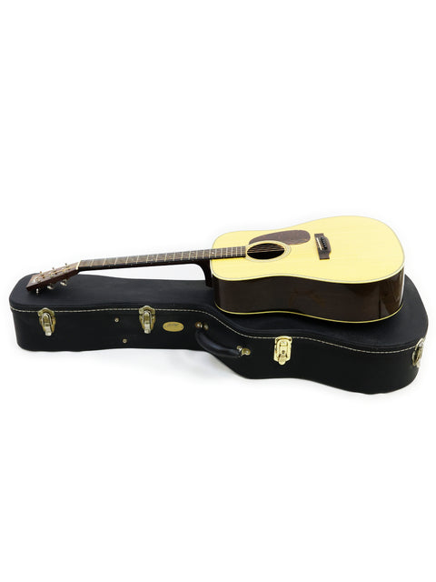 A Collings D2H guitar, made in the USA in 2006, sits in its case on a white background, emphasizing its classic style.