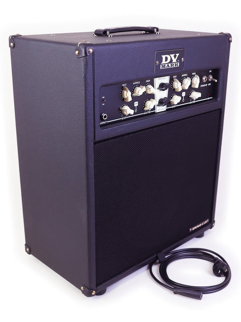 A DV Mark guitar amplifier with control knobs and a power cable.