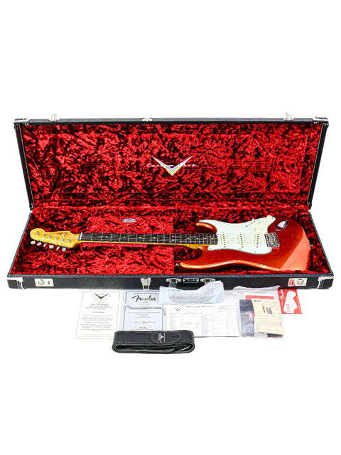  A Fender Ltd NAMM '64 Stratocaster Relic featuring a striking red, black, and white color scheme, crafted in the USA, 2017.
