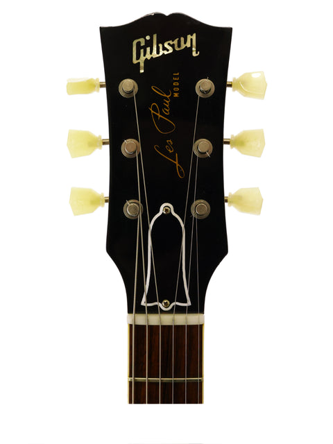 A Gibson Les Paul Custom Jr. guitar, featuring a gold top finish, showcasing its vintage 1956 reissue design from 2014.
