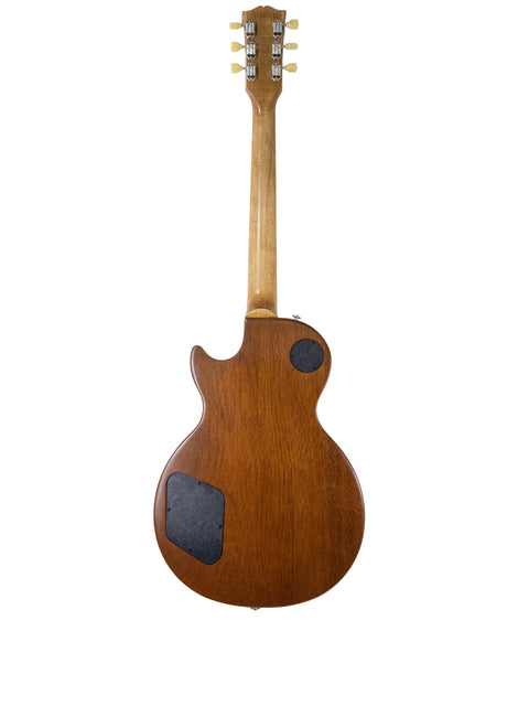 A Gibson Les Paul Tribute guitar with a wooden body and neck, showcasing its classic design and craftsmanship from 2019.