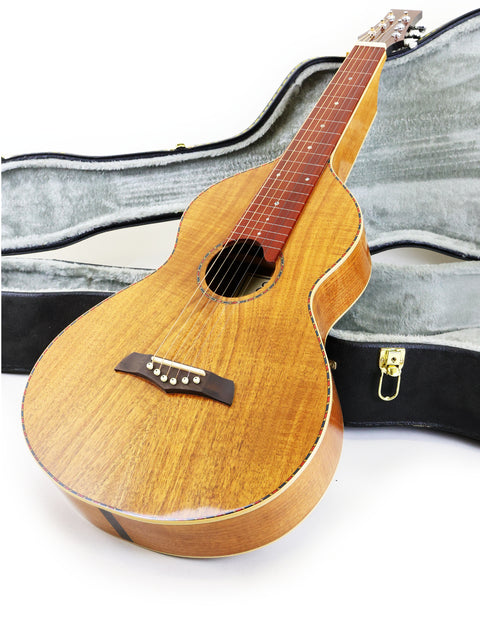 A Gilet WB guitar resting in its case, highlighting the Weissenborn style, crafted in Australia in 2014.