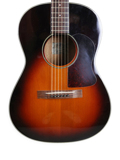 A K. Yairi G-1F guitar with a sunburst finish, crafted in Japan in 2005, showcasing its vibrant color and design.