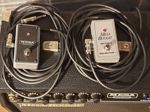 A Mesa Boogie Mark III amplifier from 1987 with two guitar pedals on top, highlighting a vintage music gear arrangement.