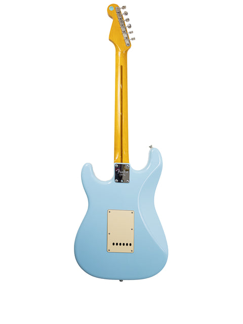 A Warmoth Strat Partscaster from 2012, showcasing a sleek Fender American Standard Stratocaster design in vibrant colors.
