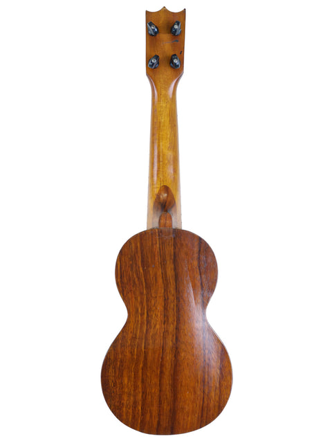 A beautifully crafted Kaai Style 2 Koa Ukulele, with a wooden body and elegant black headstock, dating back to c.1918.
