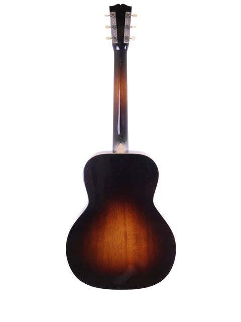A beautifully crafted guitar featuring a rich brown back and neck, made by Beau Hannam in Australia, 2009.