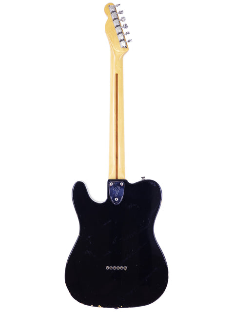 A black Fender Telecaster Custom electric guitar with a wooden body, crafted in the USA, model year 1978.